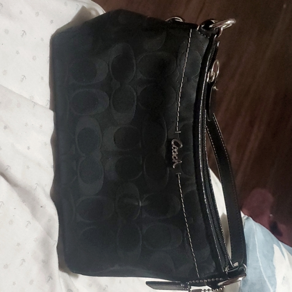 coach purse , black in color
